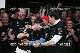 Race winner Nico Rosberg (GER) Mercedes AMG F1 celebrates the Constructors' title with Niki Lauda (AUT) Mercedes Non-Executive Chairman; Toto Wolff (GER) Mercedes AMG F1 Shareholder and Executive Director; and the team. 09.10.2016. Formula 1 World Championship, Rd 17, Japanese Grand Prix, Suzuka, Japan, Race Day.
