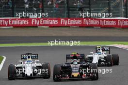 Carlos Sainz Jr (ESP) Scuderia Toro Rosso STR11 and Felipe Massa (BRA) Williams FW38 battle for position. 09.10.2016. Formula 1 World Championship, Rd 17, Japanese Grand Prix, Suzuka, Japan, Race Day.
