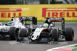 Nico Hulkenberg (GER) Sahara Force India F1 VJM09 and Valtteri Bottas (FIN) Williams FW38 battle for position. 09.10.2016. Formula 1 World Championship, Rd 17, Japanese Grand Prix, Suzuka, Japan, Race Day.