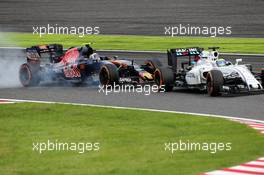Felipe Massa (BRA) Williams FW38 and Carlos Sainz Jr (ESP) Scuderia Toro Rosso STR11 battle for position. 09.10.2016. Formula 1 World Championship, Rd 17, Japanese Grand Prix, Suzuka, Japan, Race Day.