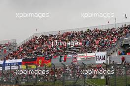 Fans in the grandstand. 08.10.2016. Formula 1 World Championship, Rd 17, Japanese Grand Prix, Suzuka, Japan, Qualifying Day.