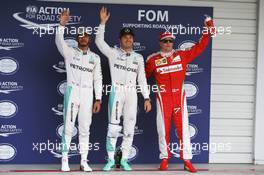 Qualifying top three in parc ferme (L to R): Lewis Hamilton (GBR) Mercedes AMG F1, second; Nico Rosberg (GER) Mercedes AMG F1, pole position; Kimi Raikkonen (FIN) Ferrari, third. Japanese Grand Prix, Saturday 8th October 2016. Suzuka, Japan. 08.10.2016. Formula 1 World Championship, Rd 17, Japanese Grand Prix, Suzuka, Japan, Qualifying Day.