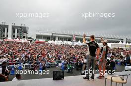 (L to R): Nico Hulkenberg (GER) Sahara Force India F1 and Sergio Perez (MEX) Sahara Force India F1 at the fans' stage. 08.10.2016. Formula 1 World Championship, Rd 17, Japanese Grand Prix, Suzuka, Japan, Qualifying Day.