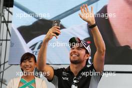 Sergio Perez (MEX) Sahara Force India F1 at the fans' stage. 08.10.2016. Formula 1 World Championship, Rd 17, Japanese Grand Prix, Suzuka, Japan, Qualifying Day.