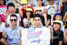 (L to R): Pascal Wehrlein (GER) Manor Racing and team mate Esteban Ocon (FRA) Manor Racing with young fans. 06.10.2016. Formula 1 World Championship, Rd 17, Japanese Grand Prix, Suzuka, Japan, Preparation Day.