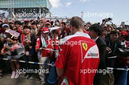 Sebastian Vettel (GER) Ferrari with fans. 06.10.2016. Formula 1 World Championship, Rd 17, Japanese Grand Prix, Suzuka, Japan, Preparation Day.