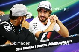 (L to R): Lewis Hamilton (GBR) Mercedes AMG F1 and Fernando Alonso (ESP) McLaren in the FIA Press Conference. 06.10.2016. Formula 1 World Championship, Rd 17, Japanese Grand Prix, Suzuka, Japan, Preparation Day.