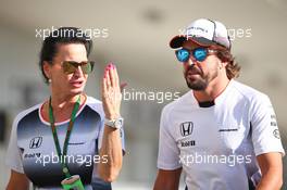Fernando Alonso (ESP) McLaren with Silvia Hoffer, McLaren Press Officer. 06.10.2016. Formula 1 World Championship, Rd 17, Japanese Grand Prix, Suzuka, Japan, Preparation Day.