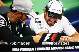(L to R): Lewis Hamilton (GBR) Mercedes AMG F1 and Fernando Alonso (ESP) McLaren in the FIA Press Conference. 06.10.2016. Formula 1 World Championship, Rd 17, Japanese Grand Prix, Suzuka, Japan, Preparation Day.