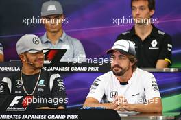 (L to R): Lewis Hamilton (GBR) Mercedes AMG F1 and Fernando Alonso (ESP) McLaren in the FIA Press Conference. 06.10.2016. Formula 1 World Championship, Rd 17, Japanese Grand Prix, Suzuka, Japan, Preparation Day.