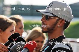 Lewis Hamilton (GBR) Mercedes AMG F1 with the media. 06.10.2016. Formula 1 World Championship, Rd 17, Japanese Grand Prix, Suzuka, Japan, Preparation Day.