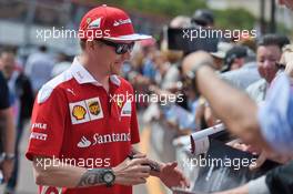 Kimi Raikkonen (FIN) Ferrari signs autographs for the fans. 27.05.2016. Formula 1 World Championship, Rd 6, Monaco Grand Prix, Monte Carlo, Monaco, Friday.