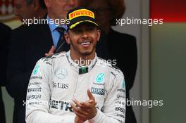 Race winner Lewis Hamilton (GBR) Mercedes AMG F1 celebrates on the podium. 29.05.2015. Formula 1 World Championship, Rd 6, Monaco Grand Prix, Monte Carlo, Monaco, Race Day.