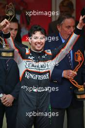 Sergio Perez (MEX) Sahara Force India F1 celebrates his third position on the podium. 29.05.2015. Formula 1 World Championship, Rd 6, Monaco Grand Prix, Monte Carlo, Monaco, Race Day.