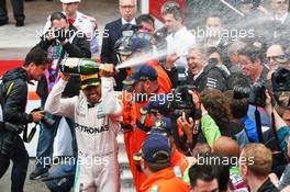 Race winner Lewis Hamilton (GBR) Mercedes AMG F1 celebrates with the champagne on the podium. 29.05.2015. Formula 1 World Championship, Rd 6, Monaco Grand Prix, Monte Carlo, Monaco, Race Day.