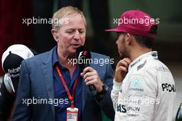 (L to R): Martin Brundle (GBR) Sky Sports Commentator with Lewis Hamilton (GBR) Mercedes AMG F1 at the podium. 29.05.2015. Formula 1 World Championship, Rd 6, Monaco Grand Prix, Monte Carlo, Monaco, Race Day.
