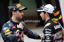 (L to R): Daniel Ricciardo (AUS) Red Bull Racing with Sergio Perez (MEX) Sahara Force India F1 at the podium. 29.05.2015. Formula 1 World Championship, Rd 6, Monaco Grand Prix, Monte Carlo, Monaco, Race Day.