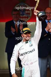 Race winner Lewis Hamilton (GBR) Mercedes AMG F1 celebrates on the podium. 29.05.2015. Formula 1 World Championship, Rd 6, Monaco Grand Prix, Monte Carlo, Monaco, Race Day.