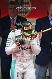 Race winner Lewis Hamilton (GBR) Mercedes AMG F1 celebrates on the podium. 29.05.2015. Formula 1 World Championship, Rd 6, Monaco Grand Prix, Monte Carlo, Monaco, Race Day.