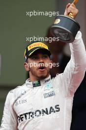 Race winner Lewis Hamilton (GBR) Mercedes AMG F1 celebrates on the podium. 29.05.2015. Formula 1 World Championship, Rd 6, Monaco Grand Prix, Monte Carlo, Monaco, Race Day.