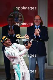 Race winner Lewis Hamilton (GBR) Mercedes AMG F1 celebrates on the podium. 29.05.2015. Formula 1 World Championship, Rd 6, Monaco Grand Prix, Monte Carlo, Monaco, Race Day.