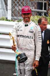 Race winner Lewis Hamilton (GBR) Mercedes AMG F1 at the podium. 29.05.2015. Formula 1 World Championship, Rd 6, Monaco Grand Prix, Monte Carlo, Monaco, Race Day.