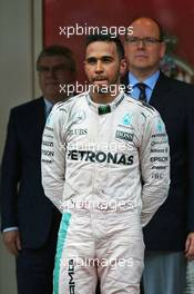 Race winner Lewis Hamilton (GBR) Mercedes AMG F1 on the podium. 29.05.2015. Formula 1 World Championship, Rd 6, Monaco Grand Prix, Monte Carlo, Monaco, Race Day.