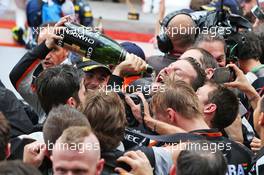 Sergio Perez (MEX) Sahara Force India F1 celebrates his third position with the champagne with the team. 29.05.2015. Formula 1 World Championship, Rd 6, Monaco Grand Prix, Monte Carlo, Monaco, Race Day.