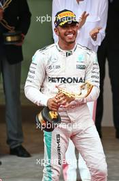 Race winner Lewis Hamilton (GBR) Mercedes AMG F1 celebrates on the podium. 29.05.2015. Formula 1 World Championship, Rd 6, Monaco Grand Prix, Monte Carlo, Monaco, Race Day.