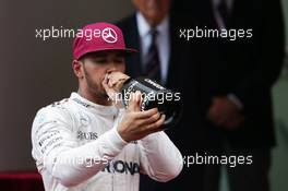 Race winner Lewis Hamilton (GBR) Mercedes AMG F1 celebrates on the podium. 29.05.2015. Formula 1 World Championship, Rd 6, Monaco Grand Prix, Monte Carlo, Monaco, Race Day.