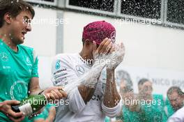 Race winner Lewis Hamilton (GBR) Mercedes AMG F1 celebrates with the team. 29.05.2015. Formula 1 World Championship, Rd 6, Monaco Grand Prix, Monte Carlo, Monaco, Race Day.