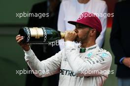 Race winner Lewis Hamilton (GBR) Mercedes AMG F1 celebrates on the podium. 29.05.2015. Formula 1 World Championship, Rd 6, Monaco Grand Prix, Monte Carlo, Monaco, Race Day.