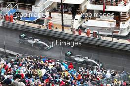 Nico Rosberg (GER) Mercedes AMG F1 W07 Hybrid leads team mate Lewis Hamilton (GBR) Mercedes AMG F1 W07 Hybrid. 29.05.2015. Formula 1 World Championship, Rd 6, Monaco Grand Prix, Monte Carlo, Monaco, Race Day.