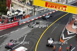 Daniil Kvyat (RUS) Scuderia Toro Rosso STR11 and Esteban Gutierrez (MEX) Haas F1 Team VF-16. 29.05.2015. Formula 1 World Championship, Rd 6, Monaco Grand Prix, Monte Carlo, Monaco, Race Day.