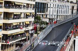 Lewis Hamilton (GBR) Mercedes AMG F1 W07 Hybrid passes team mate Nico Rosberg (GER) Mercedes AMG F1 W07 Hybrid. 29.05.2015. Formula 1 World Championship, Rd 6, Monaco Grand Prix, Monte Carlo, Monaco, Race Day.