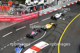 Daniil Kvyat (RUS) Scuderia Toro Rosso STR11 and Kevin Magnussen (DEN) Renault Sport F1 Team RS16 make contact. 29.05.2015. Formula 1 World Championship, Rd 6, Monaco Grand Prix, Monte Carlo, Monaco, Race Day.