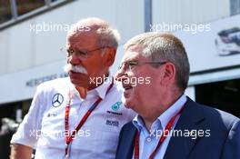 (L to R): Dr. Dieter Zetsche (GER) Daimler AG CEO with Thomas Bach (GER) IOC President. 28.05.2016. Formula 1 World Championship, Rd 6, Monaco Grand Prix, Monte Carlo, Monaco, Qualifying Day.