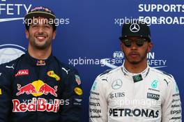 (L to R): Daniel Ricciardo (AUS) Red Bull Racing celebrates his pole position in parc ferme with third placed Lewis Hamilton (GBR) Mercedes AMG F1. 28.05.2016. Formula 1 World Championship, Rd 6, Monaco Grand Prix, Monte Carlo, Monaco, Qualifying Day.