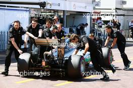 Lewis Hamilton (GBR) Mercedes AMG F1 W07 Hybrid is pushed back down the pit lane by mechanics during qualifying. 28.05.2016. Formula 1 World Championship, Rd 6, Monaco Grand Prix, Monte Carlo, Monaco, Qualifying Day.