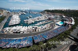 Esteban Gutierrez (MEX) Haas F1 Team VF-16 and Nico Rosberg (GER) Mercedes AMG F1 W07 Hybrid. 28.05.2016. Formula 1 World Championship, Rd 6, Monaco Grand Prix, Monte Carlo, Monaco, Qualifying Day.