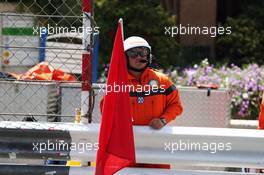 Marshal with a red flag. 28.05.2016. Formula 1 World Championship, Rd 6, Monaco Grand Prix, Monte Carlo, Monaco, Qualifying Day.