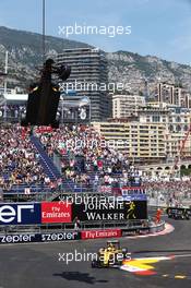 Kevin Magnussen (DEN) Renault Sport F1 Team RS16 passes the Red Bull Racing RB12 of Max Verstappen (NLD) Red Bull Racing RB12, which is on a crane during qualifying. 28.05.2016. Formula 1 World Championship, Rd 6, Monaco Grand Prix, Monte Carlo, Monaco, Qualifying Day.