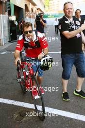 Sebastian Vettel (GER) Ferrari on his Colnago bicycle. 28.05.2016. Formula 1 World Championship, Rd 6, Monaco Grand Prix, Monte Carlo, Monaco, Qualifying Day.