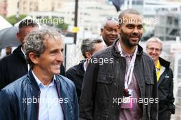 (L to R): Alain Prost (FRA) with Tony Parker (FRA) NBA Basketball Player. 29.05.2015. Formula 1 World Championship, Rd 6, Monaco Grand Prix, Monte Carlo, Monaco, Race Day.