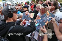 Daniil Kvyat (RUS) Scuderia Toro Rosso signs autographs for the fans. 25.05.2016. Formula 1 World Championship, Rd 6, Monaco Grand Prix, Monte Carlo, Monaco, Preparation Day.