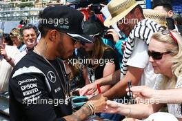 Lewis Hamilton (GBR) Mercedes AMG F1 signs autographs for the fans. 25.05.2016. Formula 1 World Championship, Rd 6, Monaco Grand Prix, Monte Carlo, Monaco, Preparation Day.
