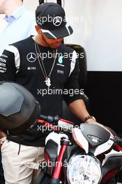 Lewis Hamilton (GBR) Mercedes AMG F1 with his motorbike. 25.05.2016. Formula 1 World Championship, Rd 6, Monaco Grand Prix, Monte Carlo, Monaco, Preparation Day.