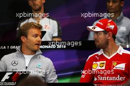 (L to R): Nico Rosberg (GER) Mercedes AMG F1 and Sebastian Vettel (GER) Ferrari in the FIA Press Conference. 25.05.2016. Formula 1 World Championship, Rd 6, Monaco Grand Prix, Monte Carlo, Monaco, Preparation Day.