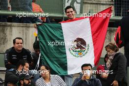Mexican flag with fans in the grandstand. 28.10.2016. Formula 1 World Championship, Rd 19, Mexican Grand Prix, Mexico City, Mexico, Practice Day.