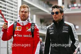 (L to R): Sebastian Vettel (GER) Ferrari with Sergio Perez (MEX) Sahara Force India F1. 28.10.2016. Formula 1 World Championship, Rd 19, Mexican Grand Prix, Mexico City, Mexico, Practice Day.